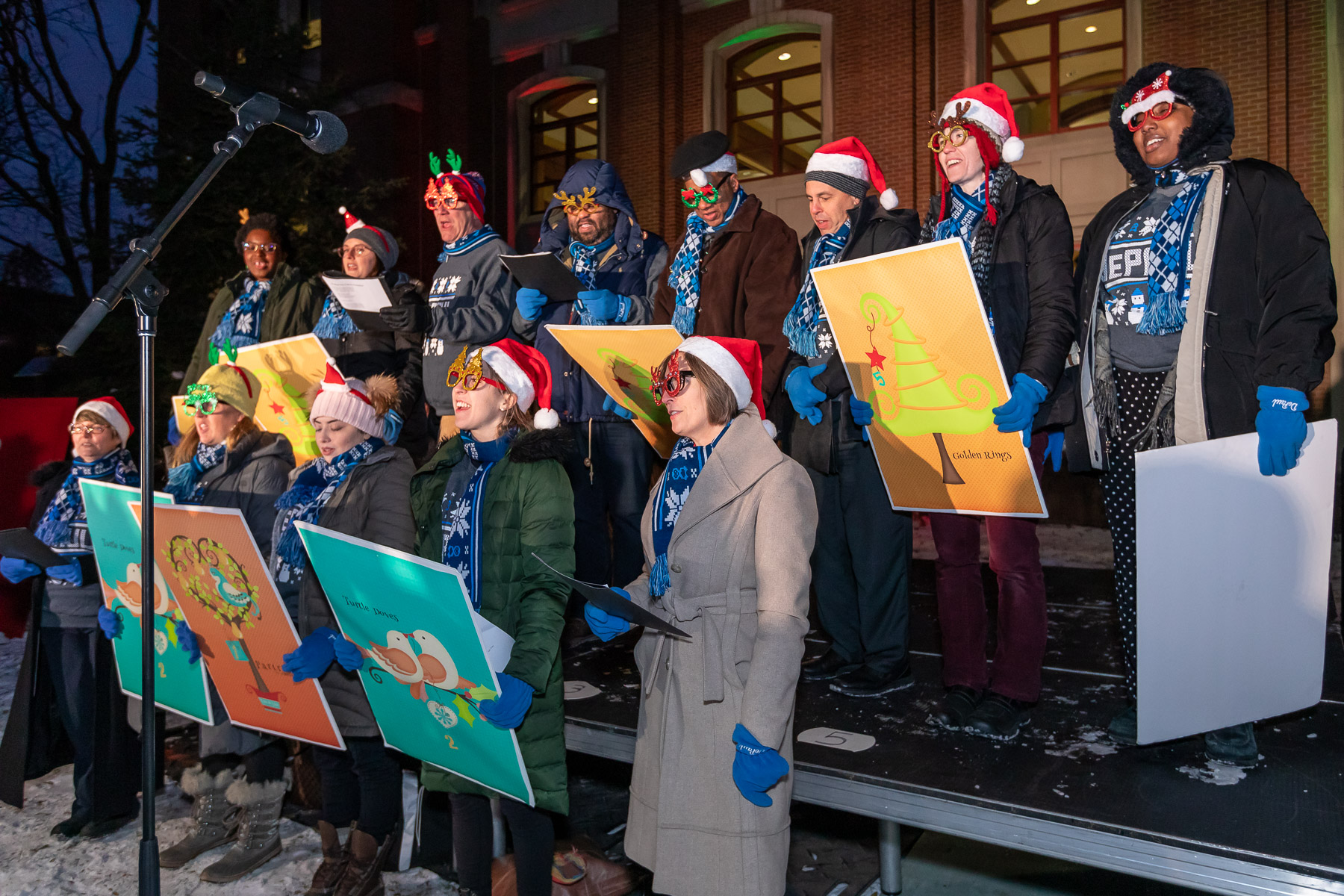 The DePaul Tree Lighting Choir, made up of DePaul staff, gave their rendition of The Twelve Days of Christmas before the tree was lit. (DePaul University/Jeff Carrion)